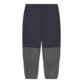 C.E CAV EMPT(シーイー) 2026FW NYLON SPLIT WARM UP PANTS ナイロンウォームアップパンツ ブラック バック