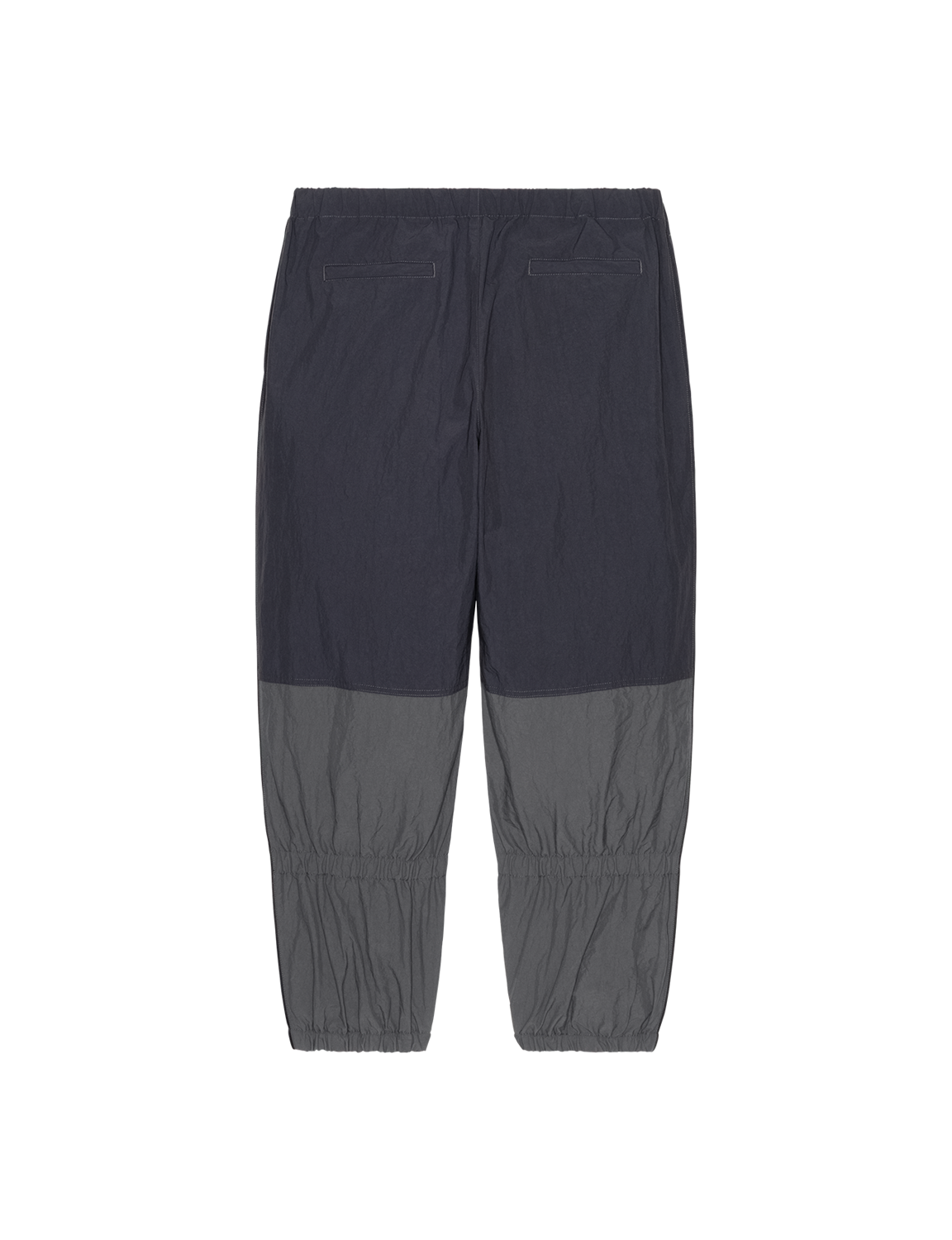 C.E CAV EMPT(シーイー) 2026FW NYLON SPLIT WARM UP PANTS ナイロンウォームアップパンツ ブラック バック