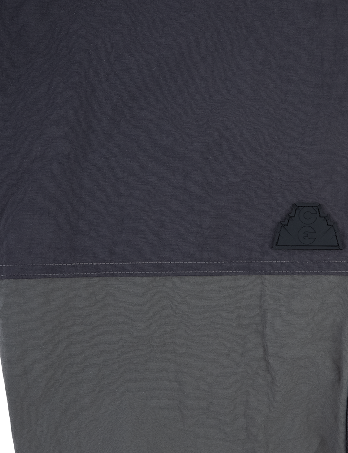 C.E CAV EMPT(シーイー) 2026FW NYLON SPLIT WARM UP PANTS ナイロンウォームアップパンツ ブラック 切り替えとポケットのディテール