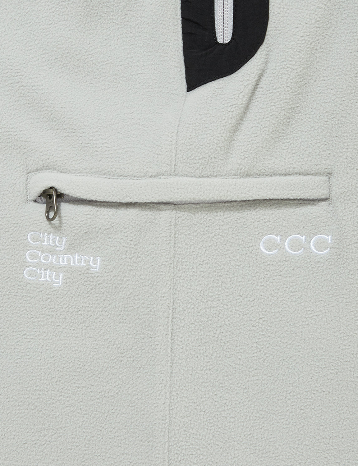 CITY COUNTRY CITY(シティ・カントリー・シティ) 2026FW × Marmot POLARTEC FLEECE PANTS フリースパンツ グレー ポケットのCCCロゴ