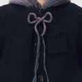 OUAT(オーユーエーティー) 2026FW META KNIT PARKA ローゲージニットフライトパーカー ネイビー 紐とボタンのディテール